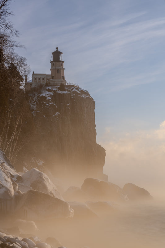 Split Rock Amidst Rising Sea Smoke