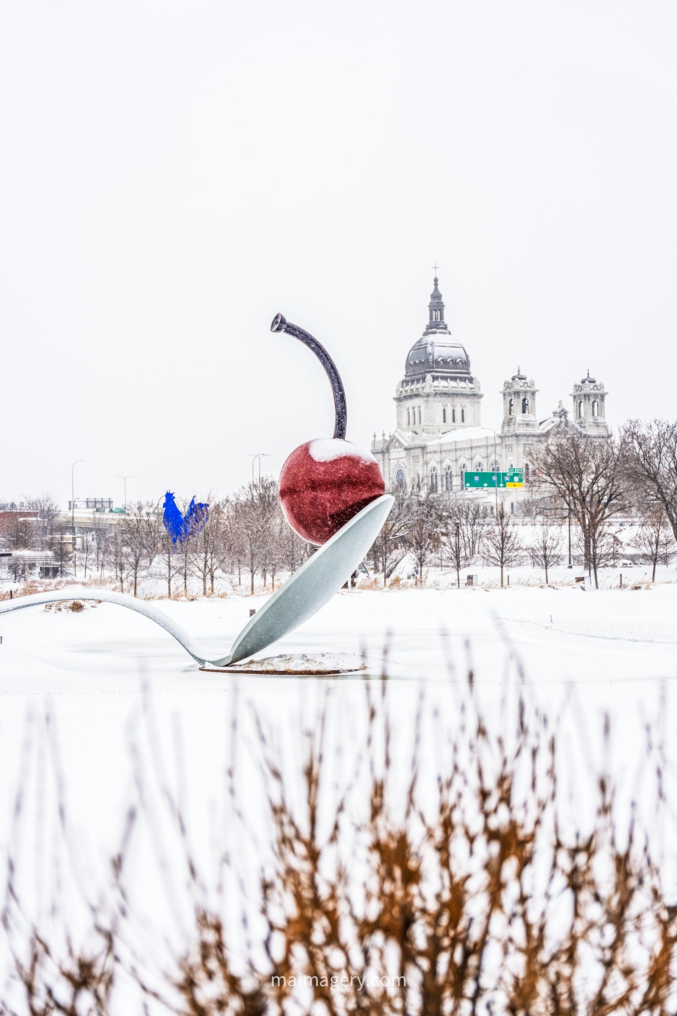 Spoon and Cherry in a Spring Snow Storm