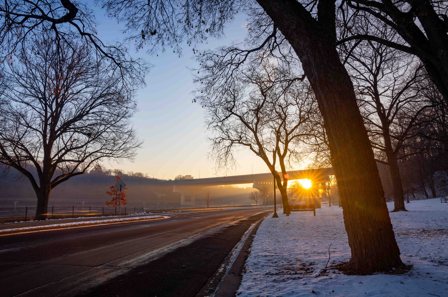 Sun Rising on the River Road